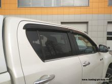 Дефлекторы боковых окон - Toyota Hilux 2015-2024 - Дефлекторы