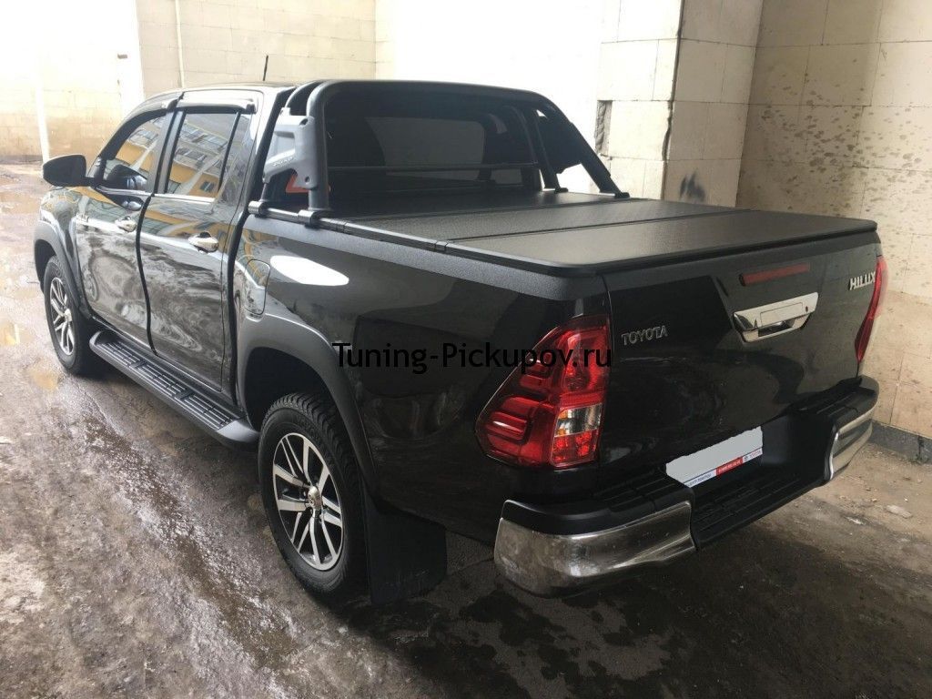 Toyota Hilux / Защитные дуги / Дуга в кузов 70 мм. (черная)