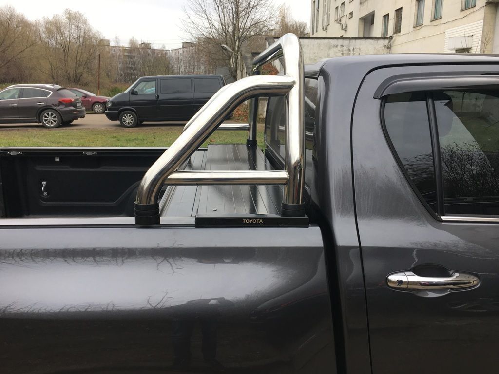 Toyota Hilux / Защитные дуги / Дуга в кузов 60 мм.