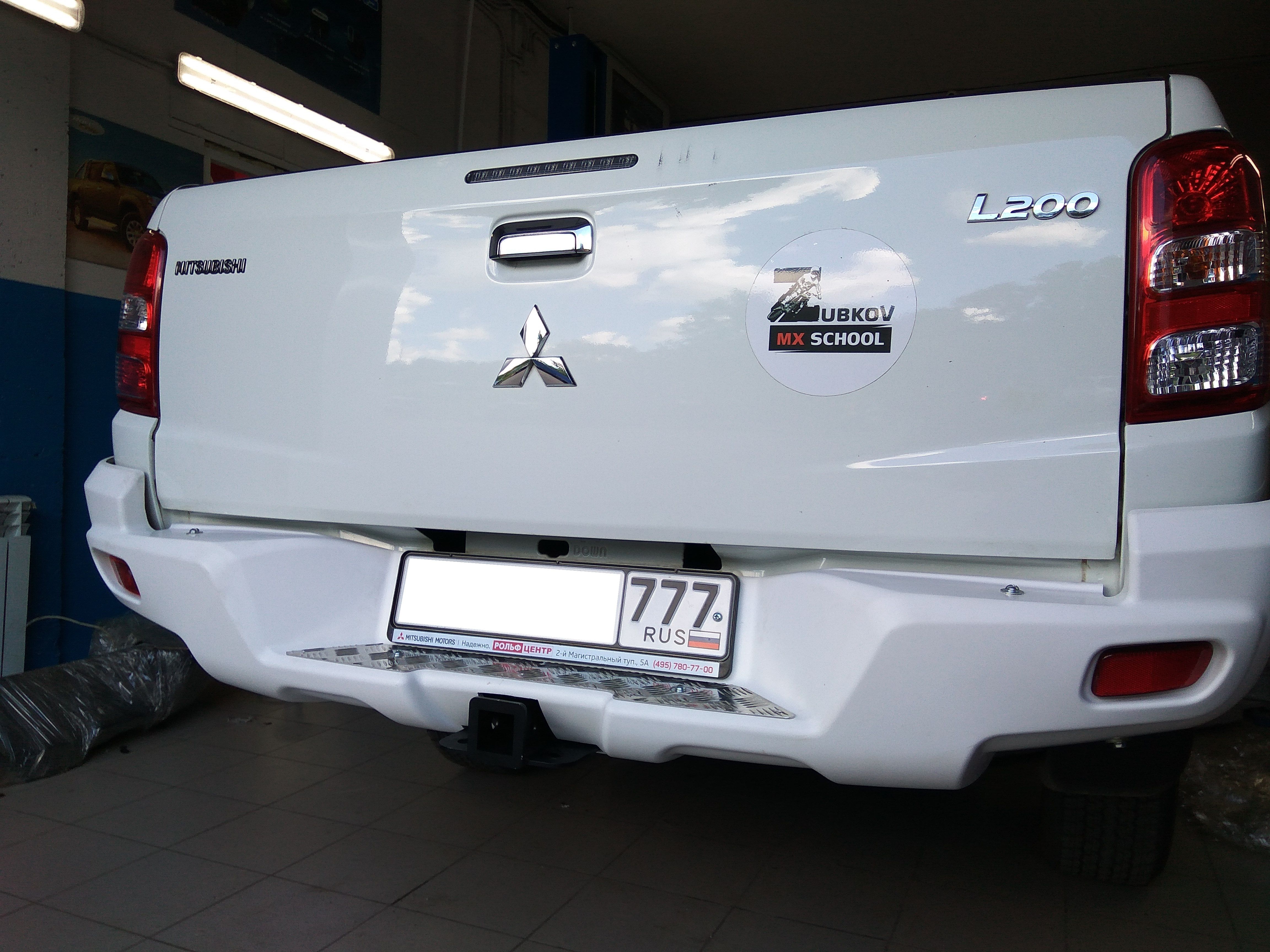 Mitsubishi / L200 2015-2024 / Бампер задний / Бампер задний усиленный (композитный) для а.м. до 2019г