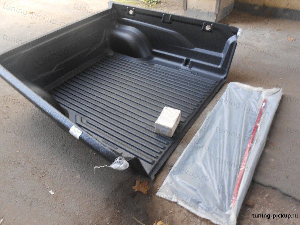 Mitsubishi / L200 2015-2024 / Вставка в кузов (вкладыш) / Вкладыш в кузов (на борт) оригинал