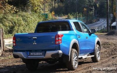 Бампер задний оригинальный - Mitsubishi L200 2015-2024 - Бампер задний - 