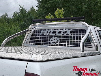 Toyota Hilux / Защитные дуги / Дуга в кузов и защита заднего стекла 75х42 мм. со светодиодной фарой (для крышки ТСС)