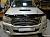Дефлектор капота (темный) - Toyota Hilux 2011-2015 - Дефлекторы