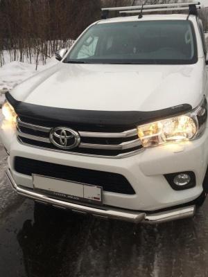 Дефлектор капота (оригинал) - Toyota Hilux 2015-2024 - Дефлекторы - 