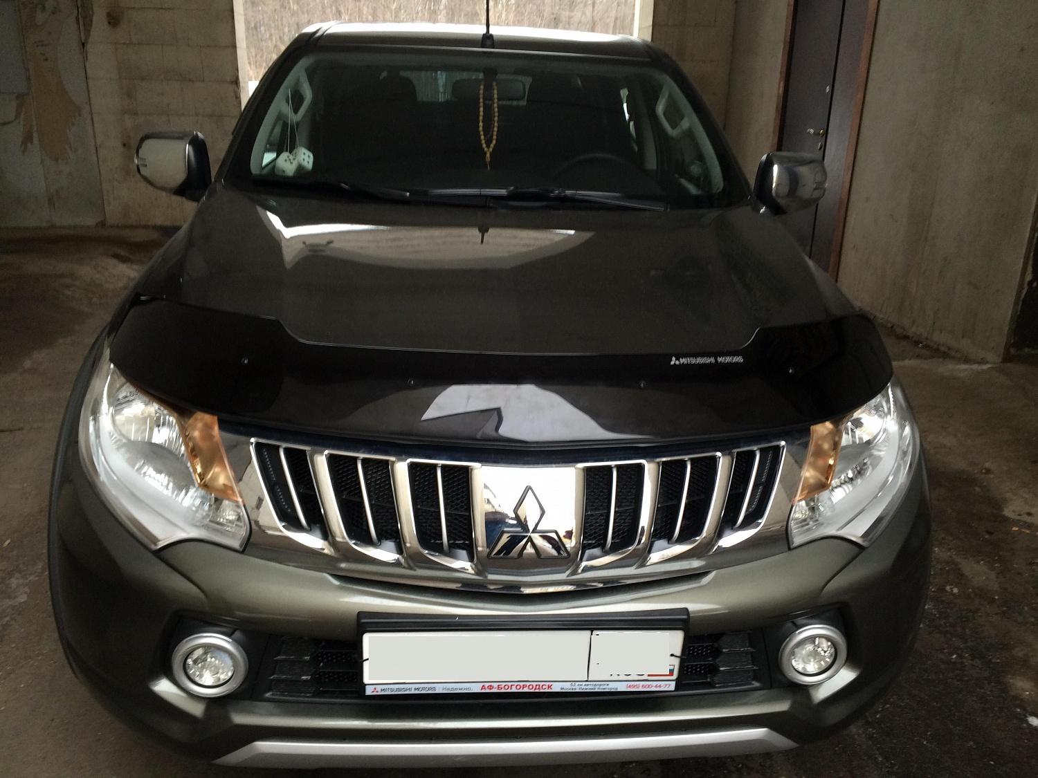 Дефлектор капота (оригинал) - Mitsubishi L200 2015-2024 - Дефлекторы - 